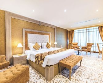 Sapphire Plaza Hotel - דוחה - חדר שינה