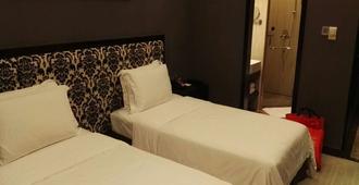 Centenio Kingdom Hotel - Foshan - Bedroom