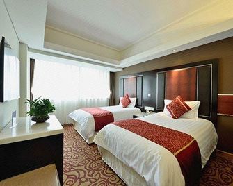 Golden Oasis Hotel - בייג'ין - חדר שינה