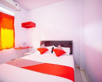 OYO 1064 Manado Airport Homestay - Manado - Phòng ngủ