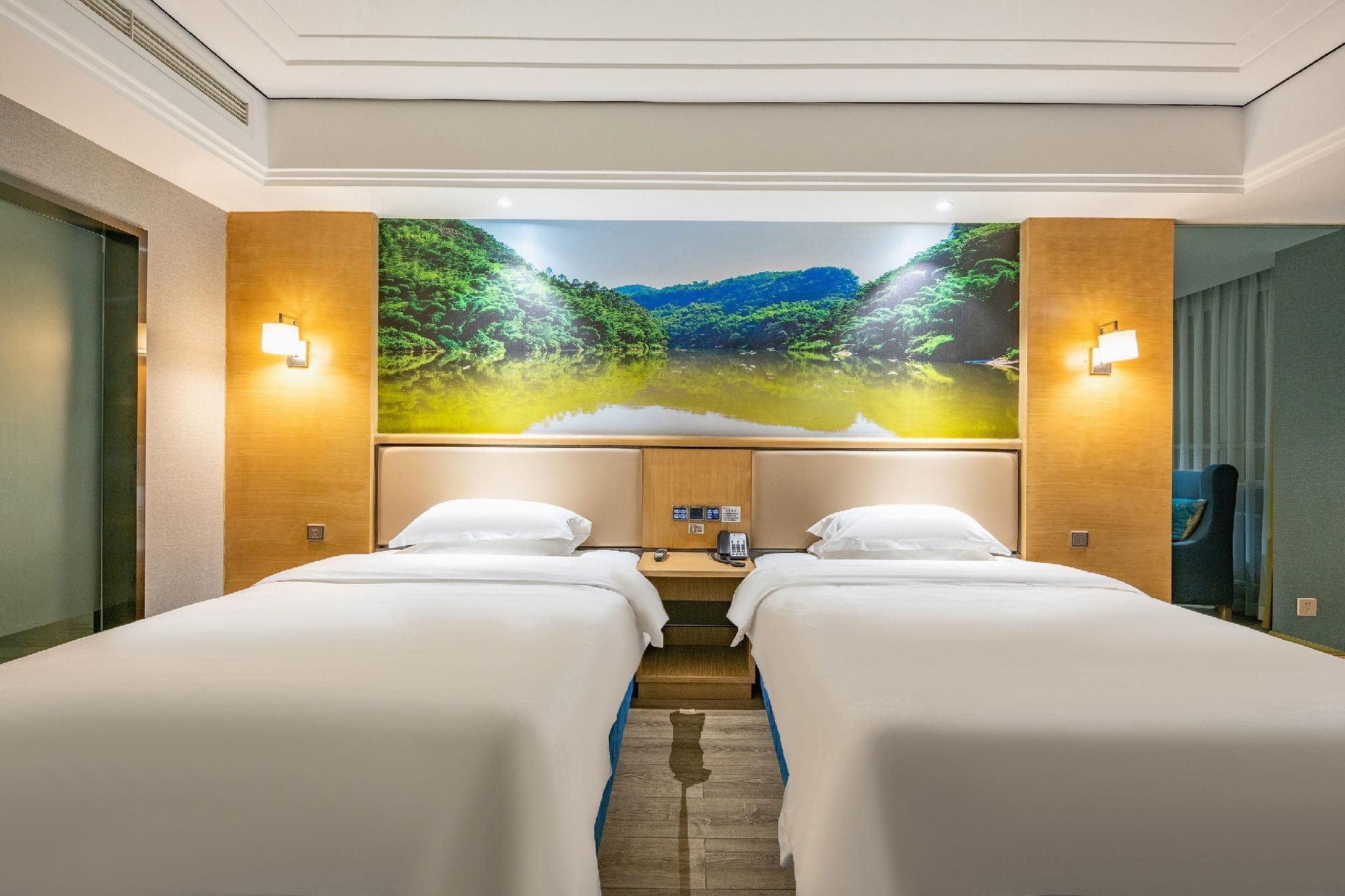 Baihai Holiday Inn - Leshan - Camera da letto