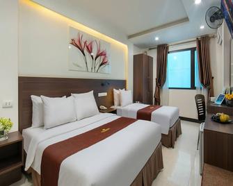 Quang Chung Hotel Le Van Thiem - האנוי - חדר שינה