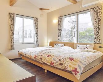 Itoshima Guesthouse & Backpackers Tomo - Hostel - Itoshima - Bedroom