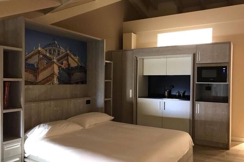 Palazzo Domanto Apartments Parma - Parma - Schlafzimmer