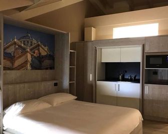 Palazzo Domanto Apartments Parma - Parma - Schlafzimmer