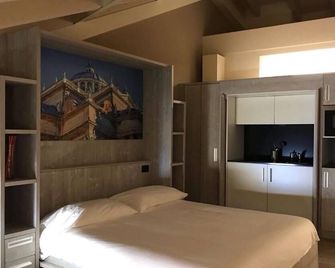 Palazzo Domanto Apartments Parma - Parma - Schlafzimmer