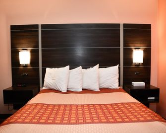 Regency Inn & Suites - Faribault - Slaapkamer