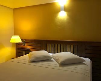 Cleia Hotel Cirino - Itacoatiara - Camera da letto