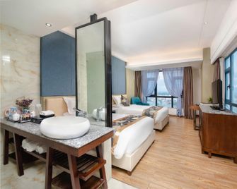 Yiyuan Lanbao Hotel - Lingshui - Bedroom