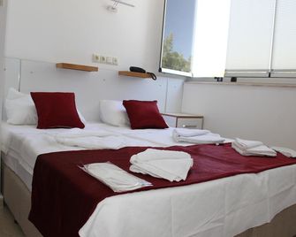 Aelbistan Otel - Дідім - Спальня