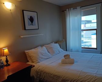 Painted Turtle Guesthouse - ננאימו - חדר שינה