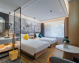 Yihe Hotel - Guangzhou - Bedroom