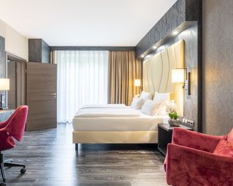 Plaza Inn Schmöker-Hof - Norderstedt - Slaapkamer