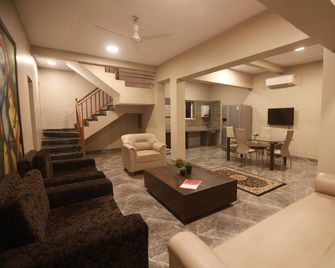 Baya Resorts & Homes - Karjat - Living room