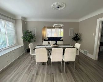 Gorgeous Colonial Home Game-room in basement. - Eastpointe - Dining room