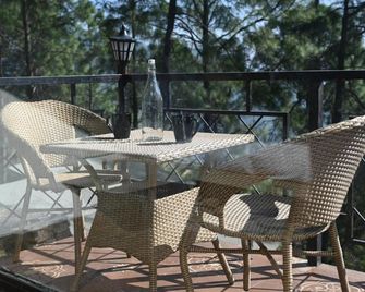 StayVista at tatvam-Mountain views & EV Station - Lansdowne - Balcony