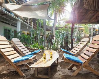Fridas Paradise | Private room | Shared pool - Brisas de Zicatela - Patio