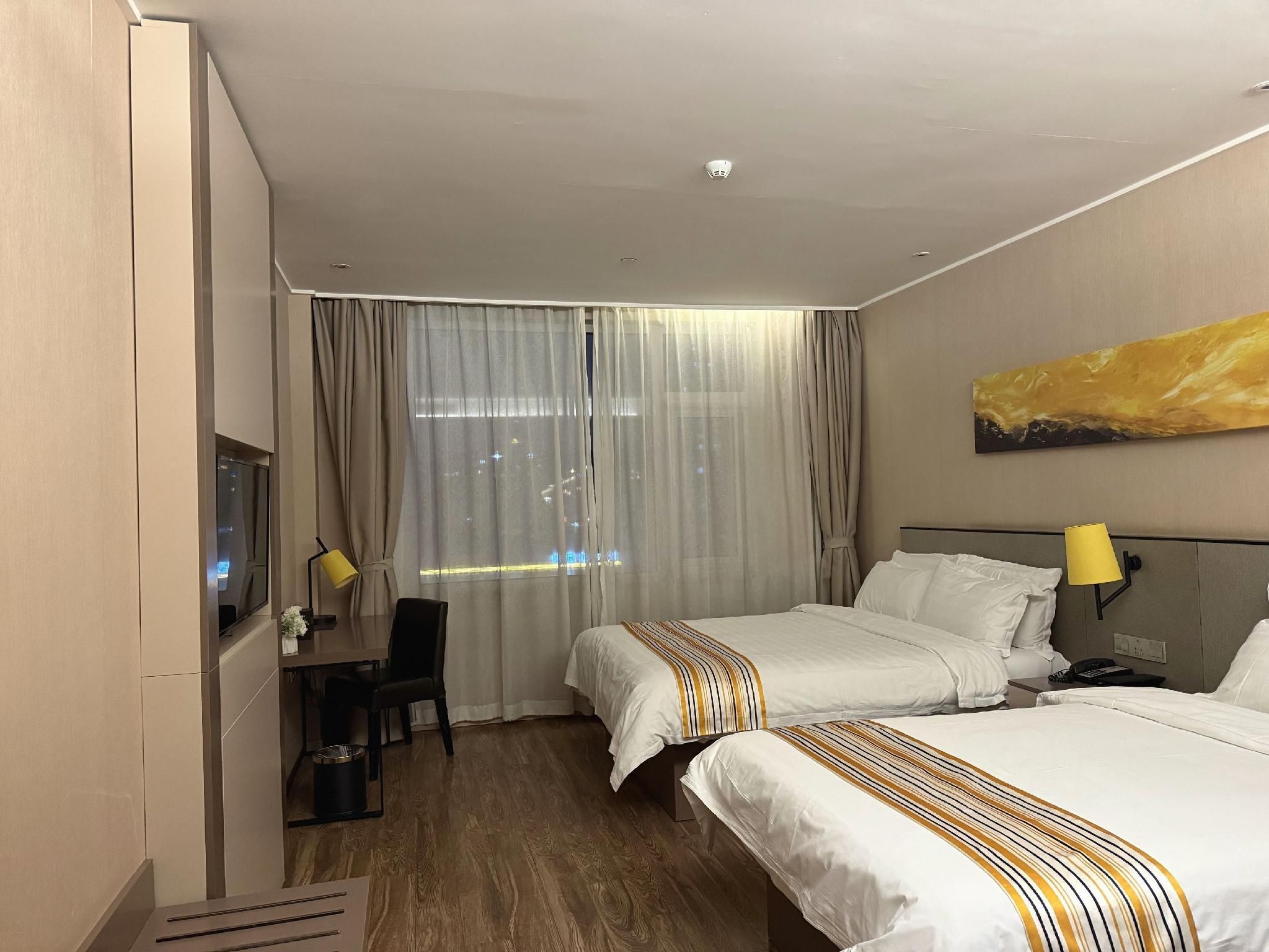 Home Inn Plus Qingdao Licang Jiushui East Road Wanda Plaza - צ'ינגדאו - חדר שינה