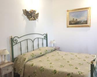 Bed & Breakfast Podere La Pace - Vada - Schlafzimmer