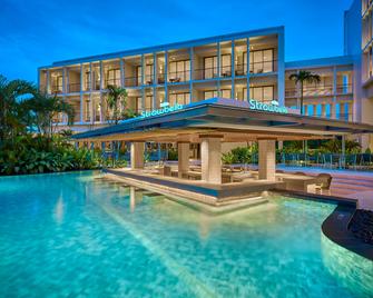 هوليداي إن ريزورت بينتان لاجوي بيتش ا باي آيتش جي - Lagoi - حوض السباحة