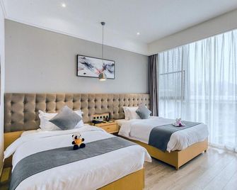 Emeishan Scenic Area Raofoge Resort Hotel - Leshan - Bedroom
