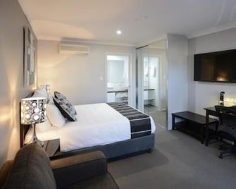 Aastro Dish Motor Inn - Parkes - Bedroom