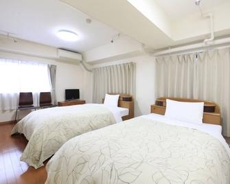 Shinjuku Urban Hotel - Tokyo - Bedroom