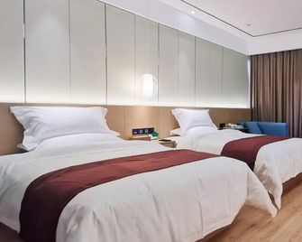 Gya Hotel Jurong England International - Zhenjiang - Schlafzimmer