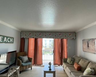 \'Sea it All\' Ocean and Pool View Condo - Galveston - Living room