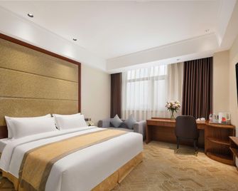 Dynamic Hotel - Dongying - Schlafzimmer