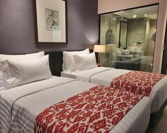 Suni Hotel & Convention Abepura Managed By Parkside - Port Numbay - Slaapkamer