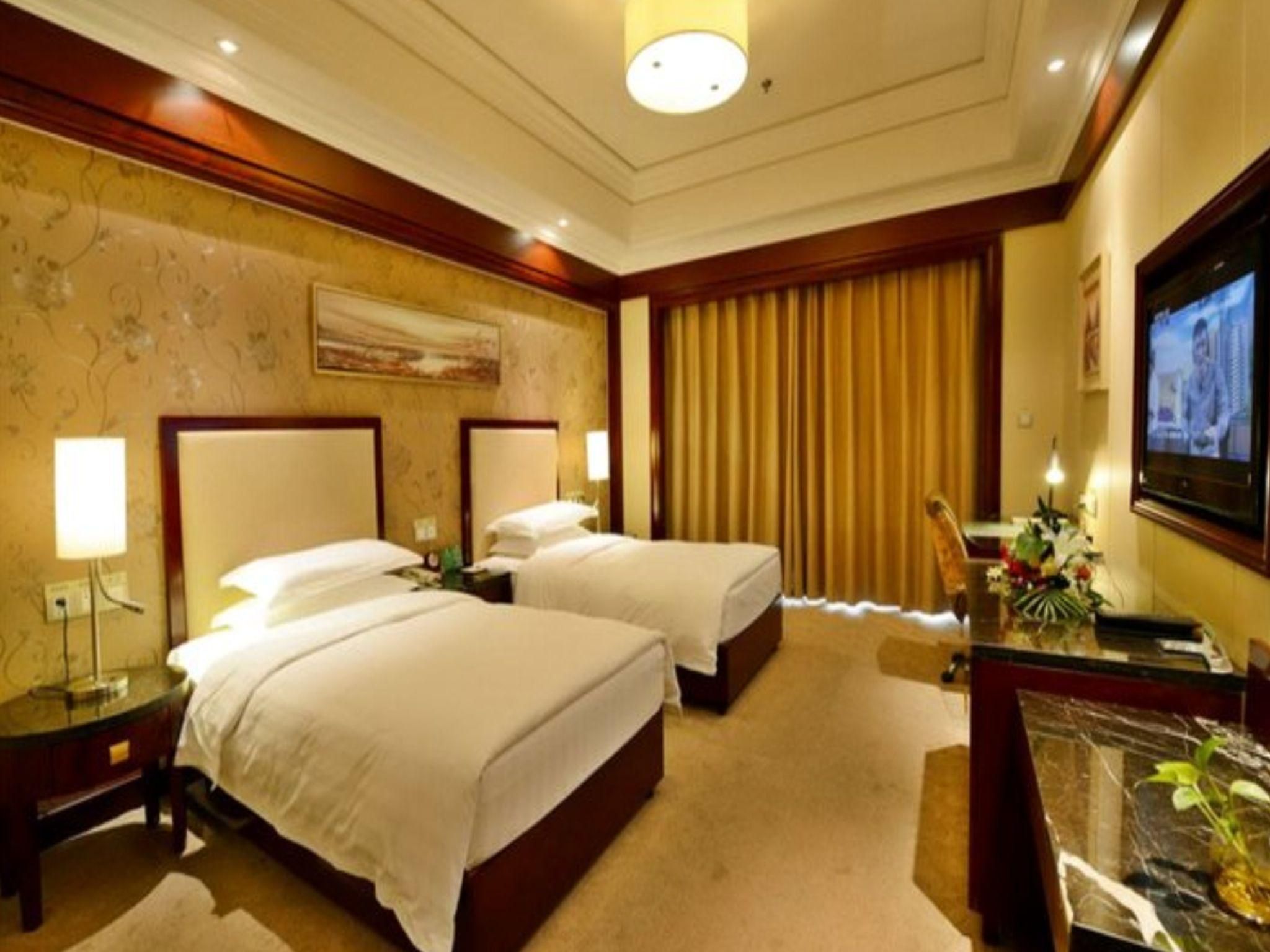 Nantong Wenfeng Hotel - נאנטונג - חדר שינה