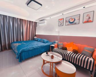 Jinxiu Qiancheng 2br Orangeheart Homestay (Jinzhou Guta Night Market Train Station Branch) - Jinzhou - Bedroom