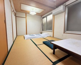 Guesthouse Kazurabashi - מיושי - חדר שינה