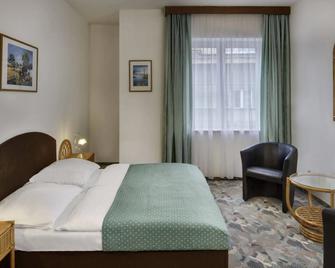 Hotel Otar - פראג - חדר שינה