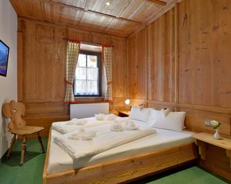 Posthotel Mayrhofen - Mayrhofen - Bedroom