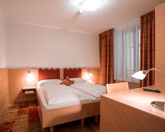 Hotel Figl - Bozen - Slaapkamer
