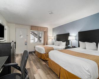 Travelodge by Wyndham Traverse City MI - טראברס סיטי - חדר שינה