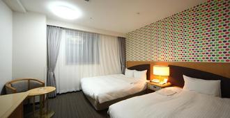 Hotel Wing International Tomakomai - Tomakomai - Schlafzimmer