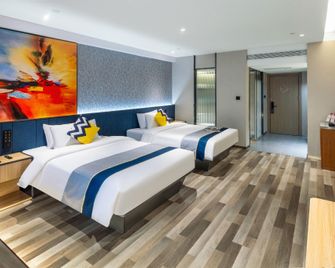 Taiyuan Wangfujing Maoye World Wanxin International Hotel - Taiyuan - Schlafzimmer