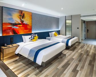 Taiyuan Wangfujing Maoye World Wanxin International Hotel - Taiyuan - Makuuhuone
