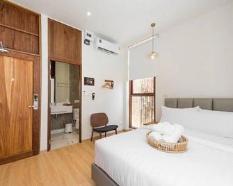 U Chaikhong - Chiang Khan - Schlafzimmer