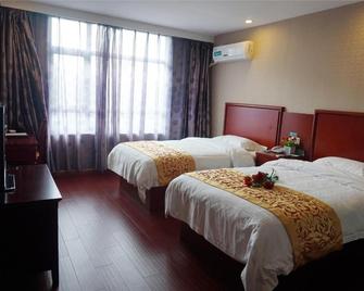 Greentree Inn Jiangsu Huaian Xiangyu Avenue New Eco-City Hexia Ancient Town Business Hotel - Huai'an - Slaapkamer