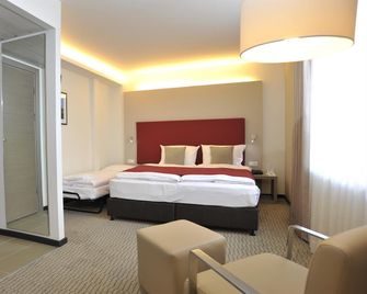 Golden Tulip Kassel Hotel Reiss - Kassel - Phòng ngủ