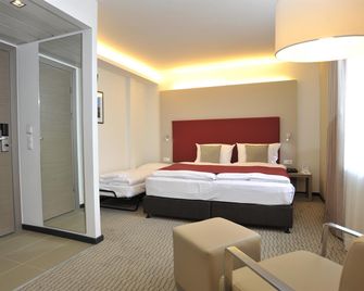 Golden Tulip Kassel Hotel Reiss - קאסל - חדר שינה