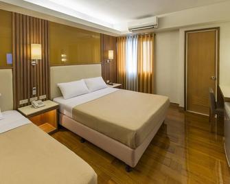 Kabayan Hotel - פאסאי סיטי - חדר שינה