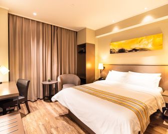 Home Inn Plus Harbin Railway Station Provincial Government Workers' Cultural Palace Metro Station - هاربين - غرفة نوم