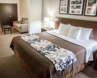 Sleep Inn & Suites Indoor Waterpark - Liberty - Slaapkamer