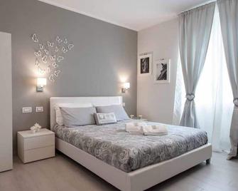 أفيتاكاميري فيلا مارسيلا - لا سبيزيا - غرفة نوم