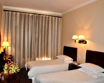 Sifang Hotel - Qingdao - Habitació
